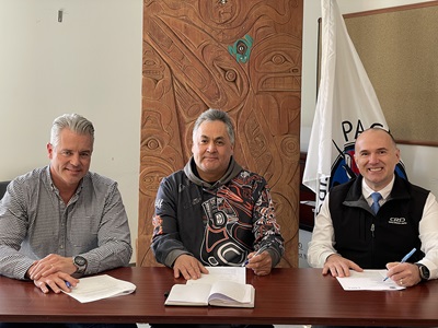CRD CAO Ted Robbins, paaʔčiidʔatx̣ (Pacheedaht) First Nation elected Chief Jeff Jones and CRD Board Chair Colin Plant sign a Memorandum of Understanding